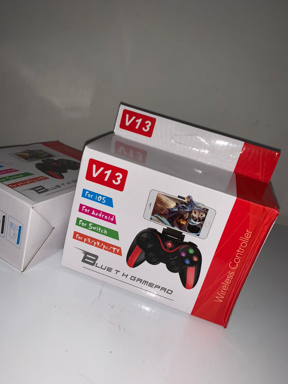يد تحكم ألعاب محمولة V13 للأيفون والأندرويد - Image 1