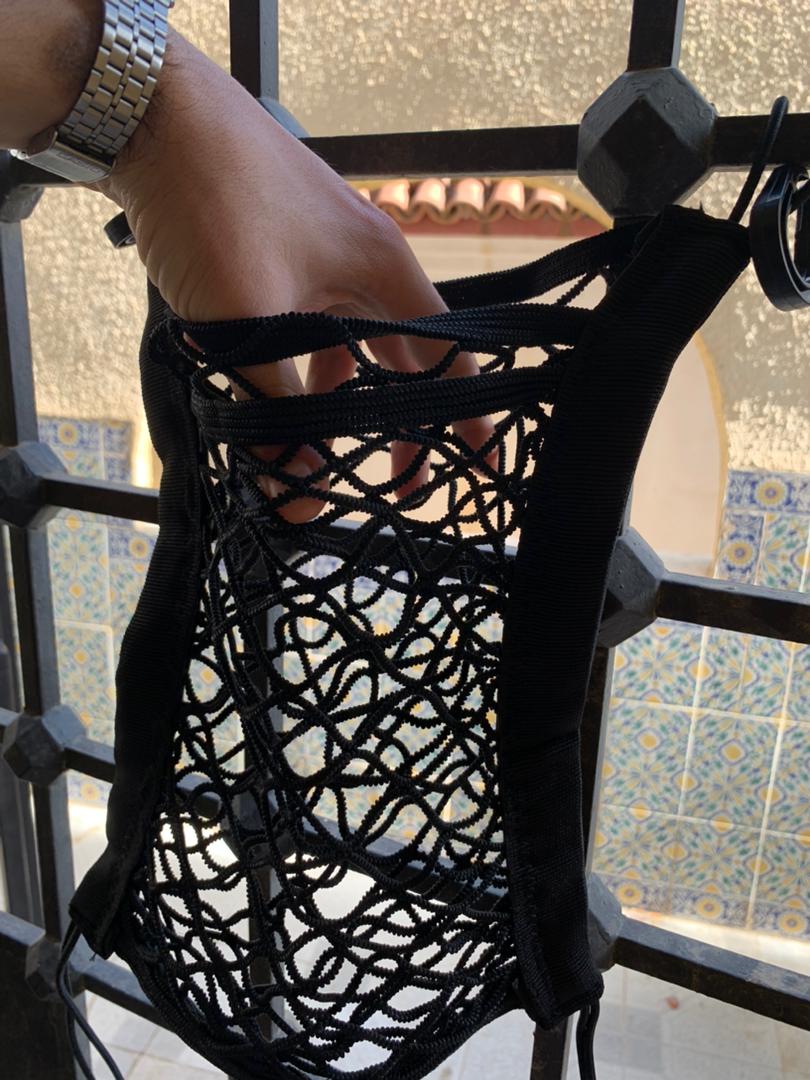 Filet de Rangement Universel en Maille pour Siège Auto – حاجز أطفال ومنظم أغراض - Image 2